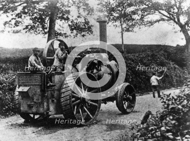 1869 Tasker traction engine with red flag man at the front
