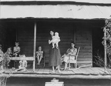 Cotton sharecropper family, Macon County, Georgia, 1937. Creator: Dorothea Lange.