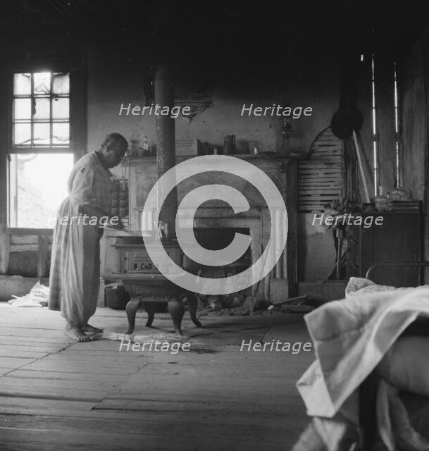 Interior of a plantation house now vacant, Greene County, Georgia, 1937. Creator: Dorothea Lange.