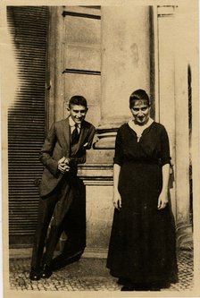 Franz Kafka with his sister Ottla before Oppelt House in Prague Artist: Anonymous  