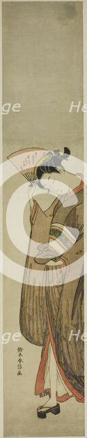Young Woman Holding a Fan, c. 1769. Creator: Suzuki Harunobu.