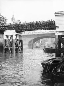 Passengers for the river bus service on the footbridge to London Bridge Pier, London, c1905. Artist: Unknown