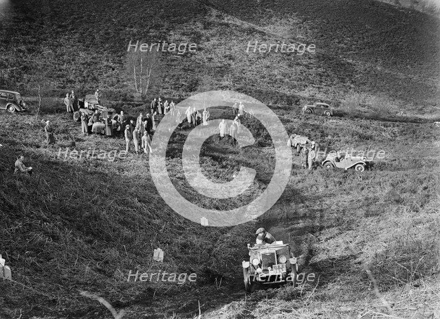 1930 Morris Minor Trials Special taking part in a motoring trial, late 1930s. Artist: Bill Brunell.