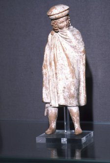 Greek Terracotta Boy wearing Cloak, Athens, 300 BC. Artist: Unknown.