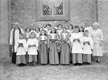 Church officials and choir, (Isle of Wight?), c1935. Creator: Kirk & Sons of Cowes.