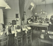 Photography students, Bloomsbury Trade School for Girls, London, 1923.  Artist: Unknown.