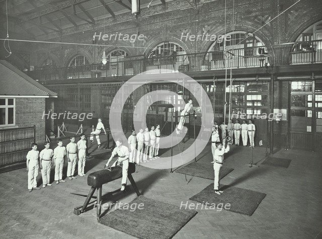 Gymnastics by male students, School of Building, Brixton, London, 1914. Artist: Unknown.