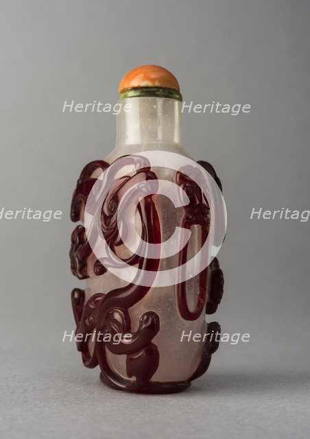Clear glass snuff bottle with red overlay, China, Qing dynasty, 1644-1911. Creator: Unknown.