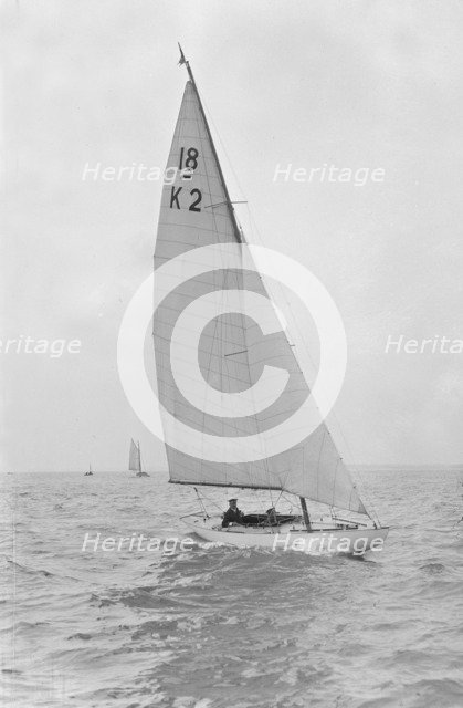 The 18-foot keelboat 'Prudence' (K2) under sail, 1922. Creator: Kirk & Sons of Cowes.