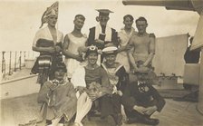 Nine men dressed up on deck, [between 1920 and 1929?]. Creator: Unknown.
