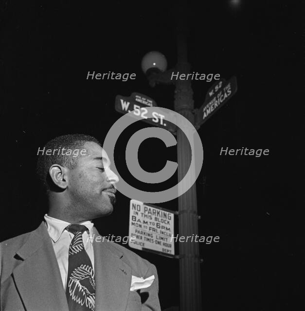 Portrait of Dizzy Gillespie, 52nd Street, New York, N.Y., 1946. Creator: William Paul Gottlieb.