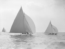 The 7 Metre 'Marsinah' (K1) and 'Anitra' (k4) racing downwind, 1912. Creator: Kirk & Sons of Cowes.