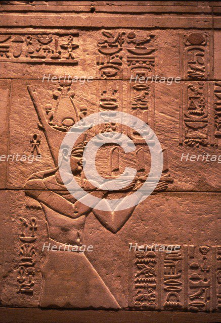 Egyptian relief of Emperor Augustus (Roman) as Pharaoh, offering to Isis, c1st century. Artist: Unknown.