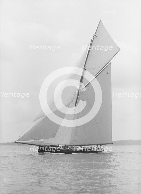 The gaff rigged cutter 'Bloodhound' sailing close-hauled, 1913. Creator: Kirk & Sons of Cowes.