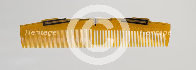 Bakelite comb from dresser set owned by Lena Horne, mid 20th Century. Creator: Agalin.