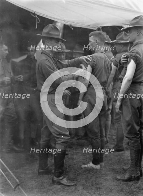 Plattsburg Reserve Officers Training Camp - Innoculations, 1916. Creator: Harris & Ewing.