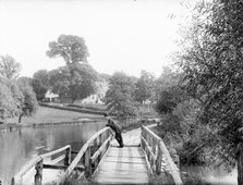 A man leaning on the handrail of the last footbridge, Iffley, Oxford, Oxfordshire, 1885. Artist: Henry Taunt