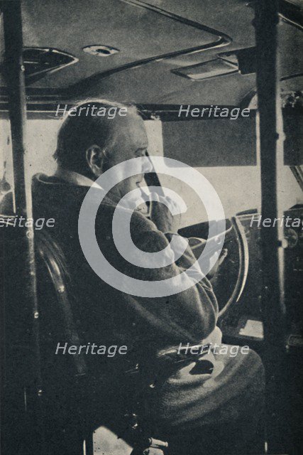 'Mr. Churchill with the R.A.F." - at the controls of the flying boat "Berwick", 1942, (1945). Creator: Unknown.