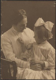 Portrait of Mother and Child with Big Bow, 1907-1924. Creator: Louis Fleckenstein.