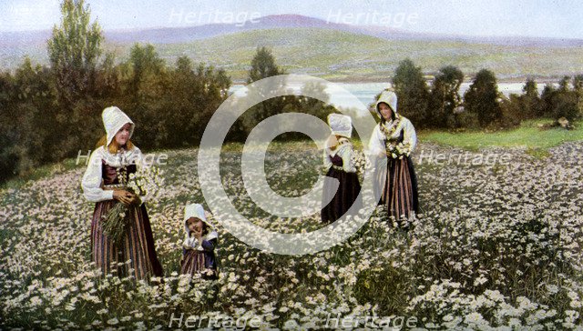 Picking flowers in a meadow near Leksand, Sweden, c1923. Artist: Unknown