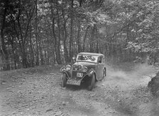 Singer coupe competing in the B&HMC Brighton-Beer Trial, Fingle Bridge Hill, Devon, 1934. Artist: Bill Brunell.