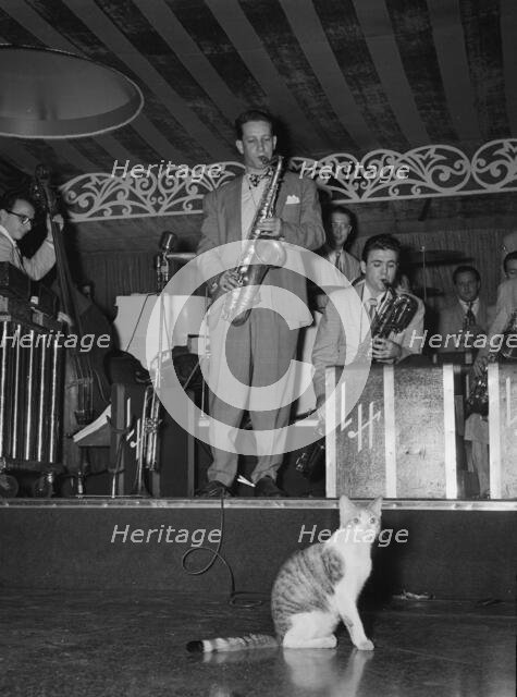 Portrait of Sam Donahue and Hep, Aquarium, New York, N.Y., ca. Dec. 1946. Creator: William Paul Gottlieb.
