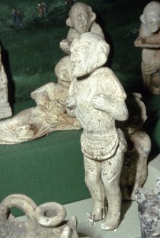 Pipeclay Figure from a Roman Grave, at Colchester, Essex, c60 AD Artist: Unknown.