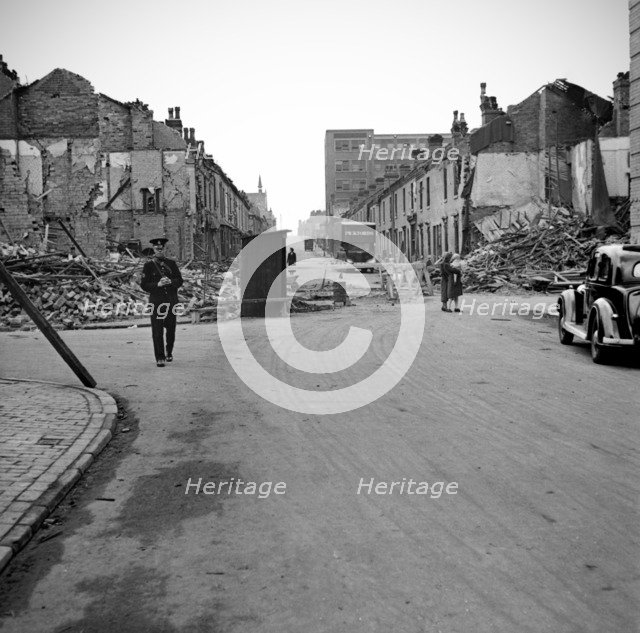 Wartime bomb damage, Long Acre, Nechells, Birmingham, West Midlands, World War II, 29 July 1942. Artist: James Nelson.