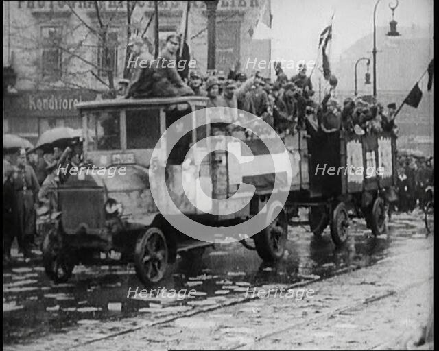 National Socialist (Nazi) Party Campaigning in Germany Scattering Pamphlets from  Trucks..., 1926. Creator: British Pathe Ltd.