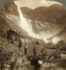 'Humble mountain home at the foot of cliffs where Skiaeggedals Falls leap 525 ft., Norrway', c1905. Creator: Unknown.