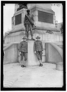 Men in uniform at Sherman Monument, Washington, D.C., between 1916 and 1918. Creator: Harris & Ewing.