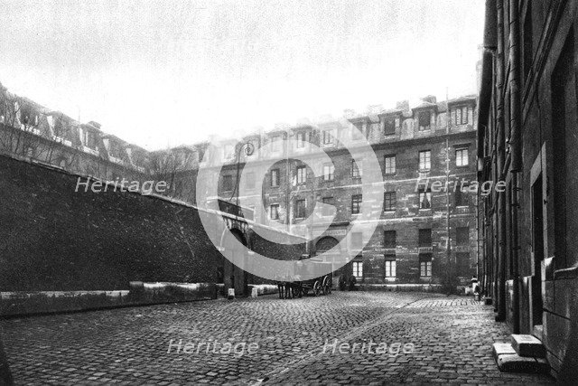 Courtyard of Saint Lazare women's prison, Paris, 1931.Artist: Ernest Flammarion