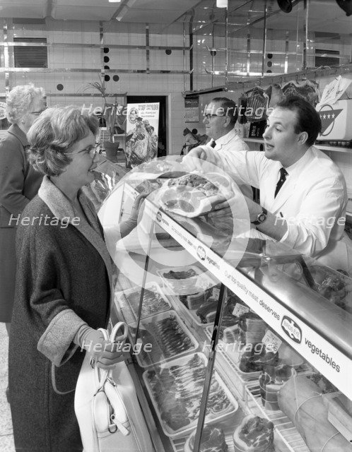 Scene inside a butcher's shop, Doncaster, South Yorkshire, 1965. Artist: Michael Walters