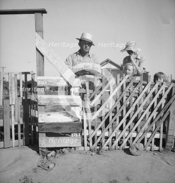 Family from Oklahoma, Highway City, near Fresno, California, 1939. Creator: Dorothea Lange.