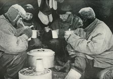 'Members of the Polar Party Having A Meal in Camp', c1911, (1913). Artist: Unknown.