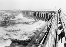 Minidoka Project - U.S. Reclamation Bureau. Minidoka Dam, One Mile Long...Idaho, 1912 Creator: Harris & Ewing.