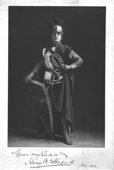 Man wearing a suit of armour, 1902. Creator: Unknown.