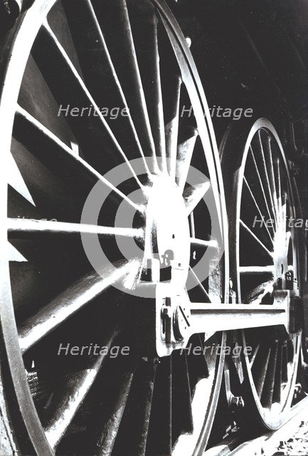 Axle wheels of a steam train engine.