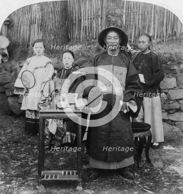 'A genial official of interior China, naval mandarin, Kinkow' (Jingzhou), China, 1900. Artist: Underwood & Underwood