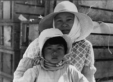Japanese mother and daughter, agricultural workers near Guadalupe, California, 1937. Creator: Dorothea Lange.