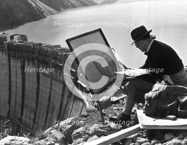 A artist from Linz painting the Limberg Dam, Austria, c1947-1951. Artist: Unknown