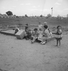 Children who attend nursery school, Farmersville FSA camp, Tulare County, California, 1939 Creator: Dorothea Lange.