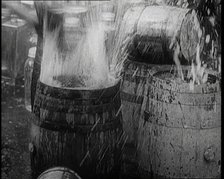 Prohibition Scenes in the United States of America. Barrels of Alcoholic Beverages Being..., 1920. Creator: British Pathe Ltd.