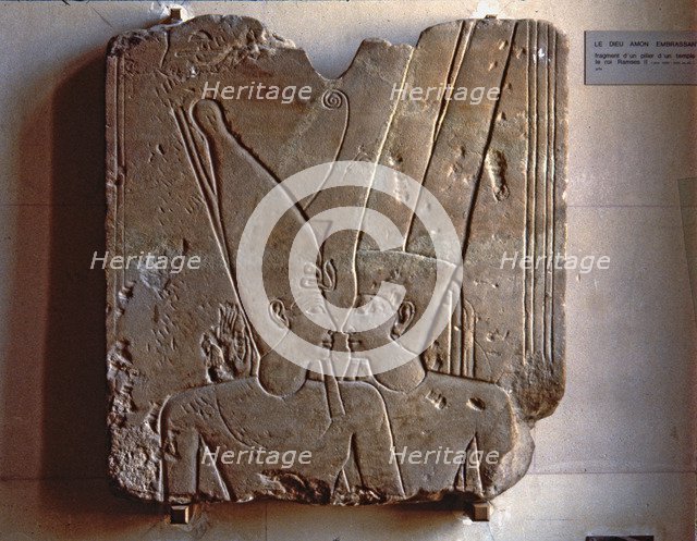 Relief of the god Amun hugging Ramses II, made in stoneware, fragment from Karnak.