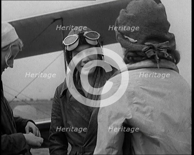 Two Female Civilians About to Pilot a Plane, 1931. Creator: British Pathe Ltd.
