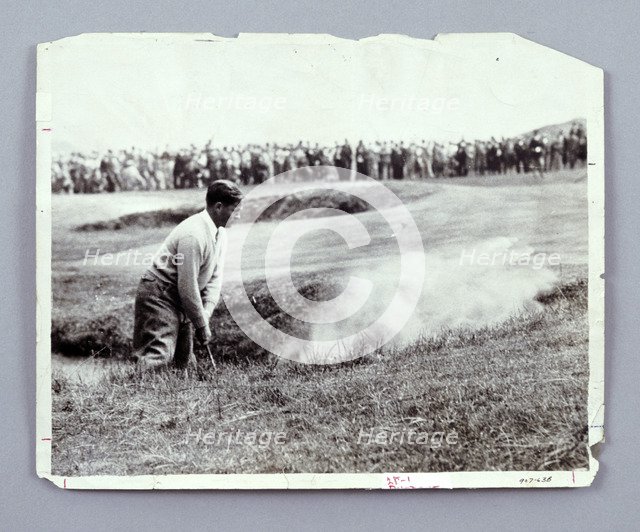 Bobby Jones playing his way out of a bunker, c1920s. Artist: Unknown