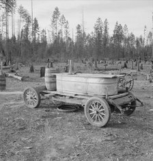 Improved water tank on stump ranch, Boundary County, Idaho, 1939. Creator: Dorothea Lange.