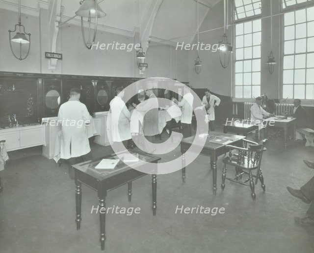Hair dressing class for men at the Bromley Non-Residential Training Centre, London, 1934. Artist: Unknown.