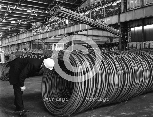 Coils and hexagonal bars at the Park Gate Iron & Steel Co, Rotherham, South Yorkshire, 1964. Artist: Michael Walters