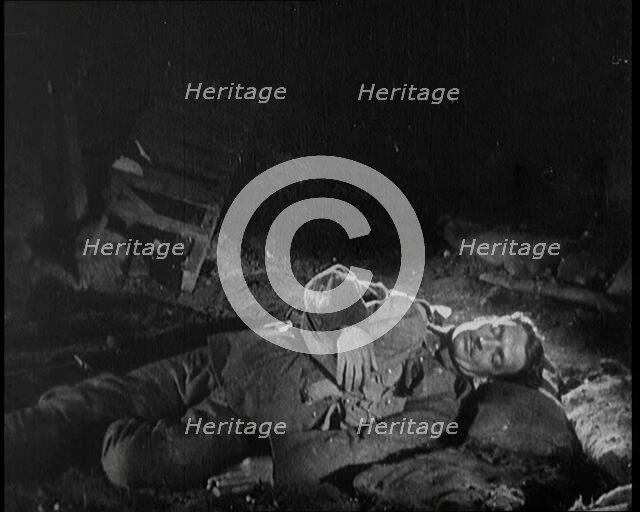 Scene from the Short Silent Feature Film 'Poppies of Flanders'. A Male Actor Portraying a..., 1920s. Creator: British Pathe Ltd.